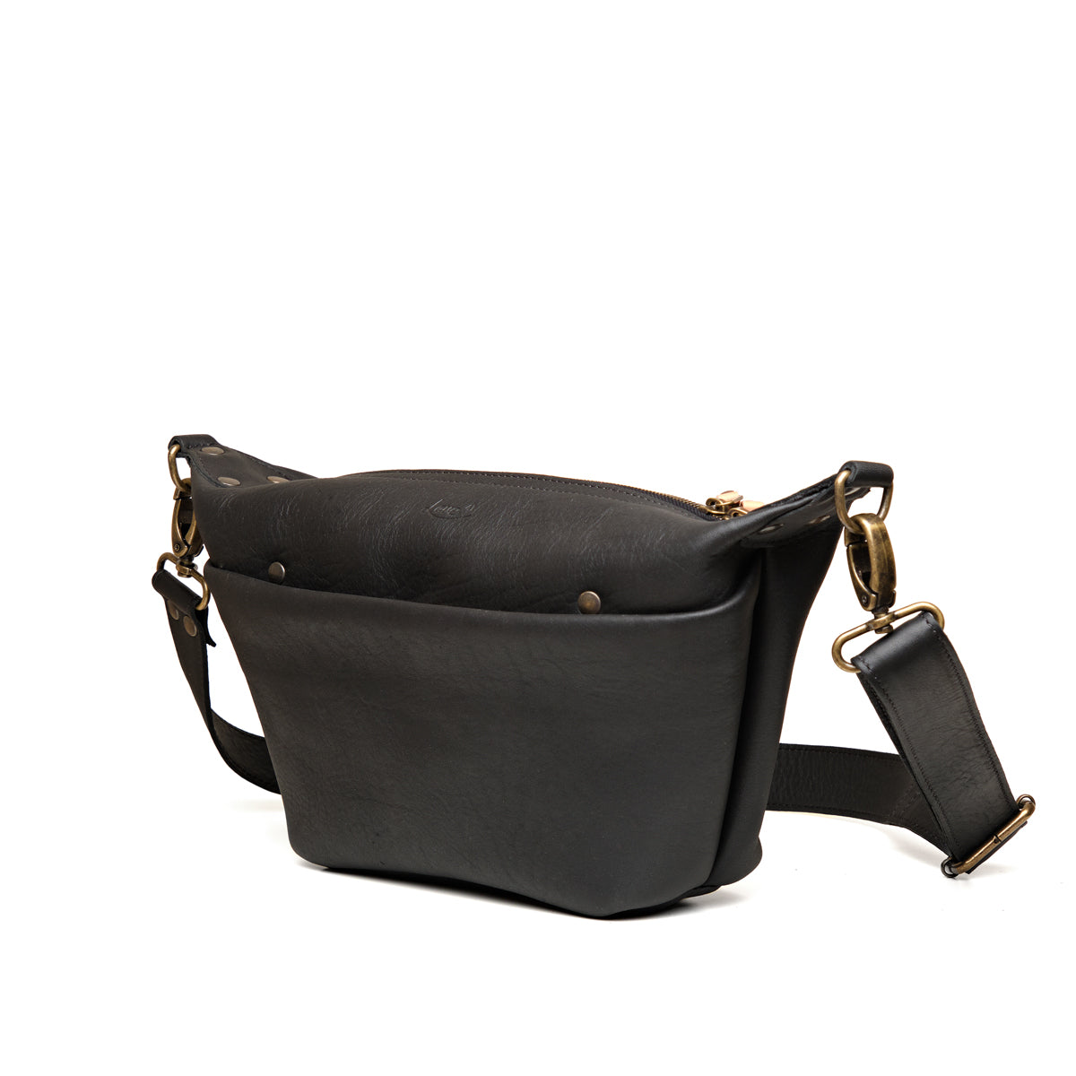 London Sling Small in Black, angled side view showing the front pocket and strap clip