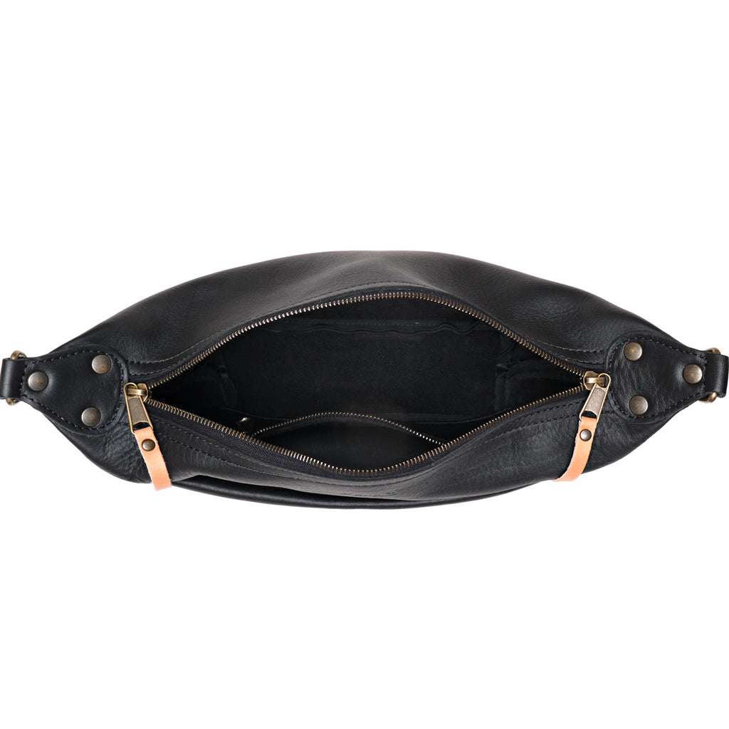 London Sling Small in Black, top view unzipped showing the empty interior