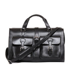 Wesley Deep Pocket Duffle in Raven Black, front view with two buckled pockets and shoulder strap