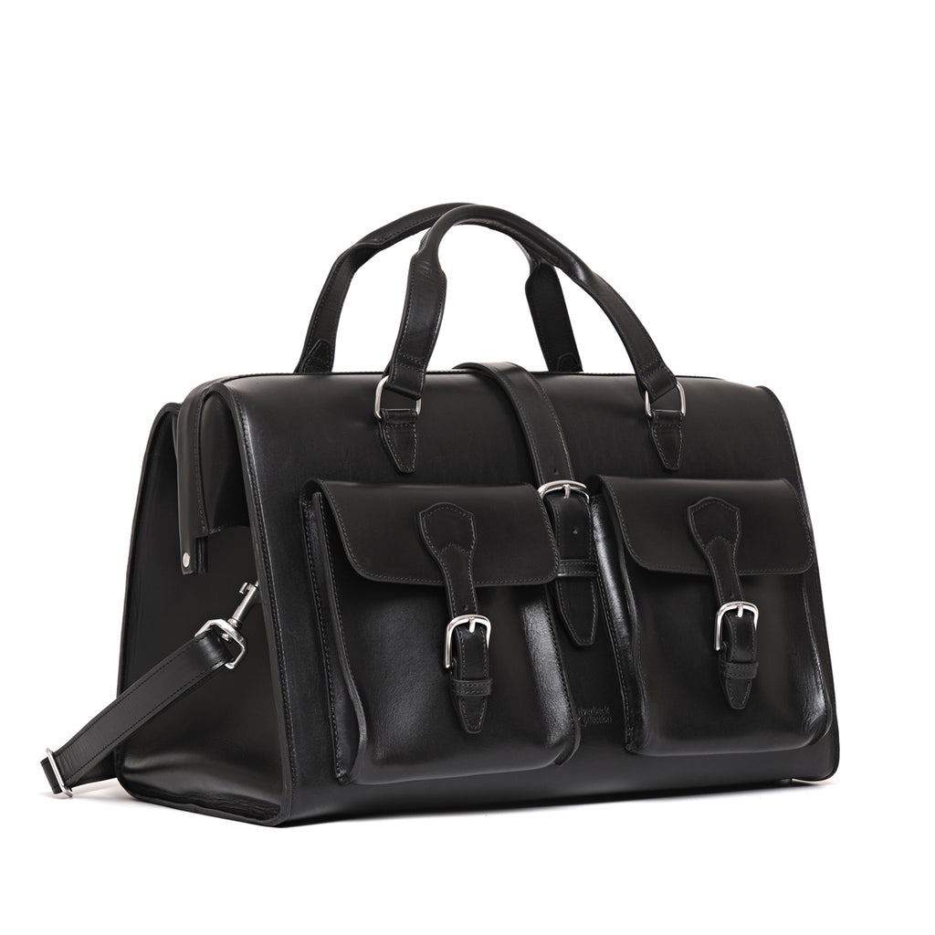 Wesley Deep Pocket Duffle in Raven Black, three-quarter view showing front pockets and side