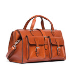 Wesley Deep Pocket Duffle in English Tan, three-quarter view showing front pockets and side