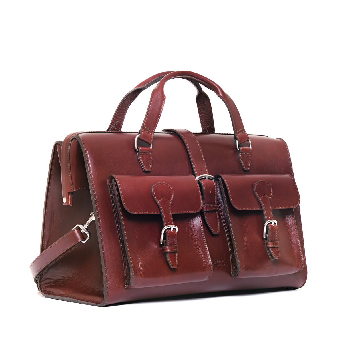 Wesley Deep Pocket Duffle in Oxblood, three-quarter view showing front pockets and side