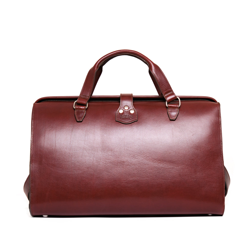 Wesley Deep Pocket Duffle in Oxblood, back view with top handles and center strap