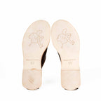 Barefoot Slip-on Mules sole view showing embossed bulldog logo, Made in Old Mexico stamp and size