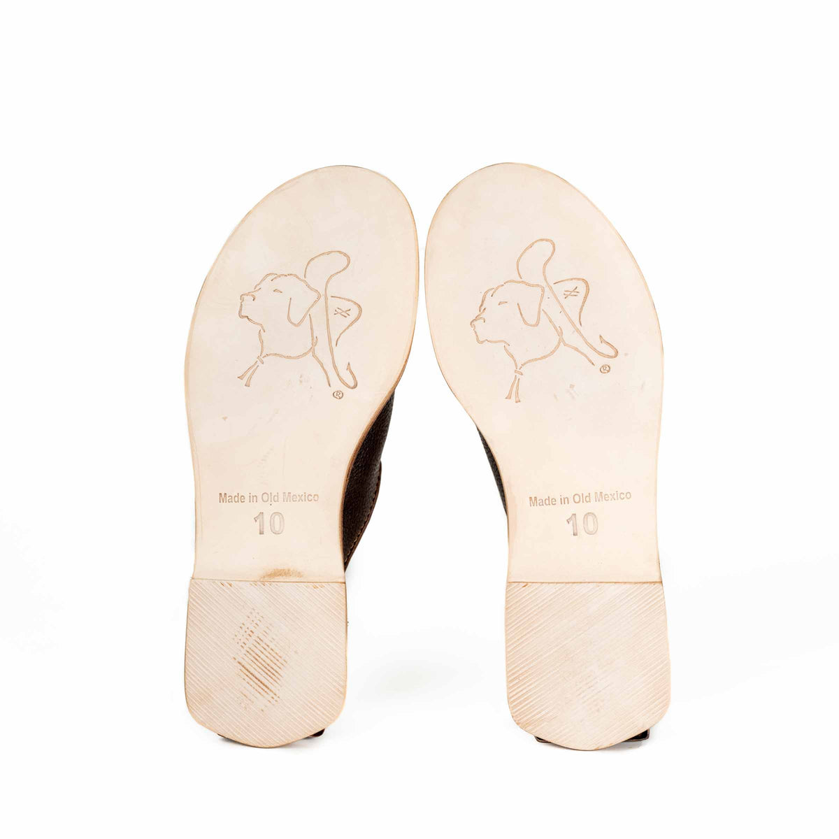 Barefoot Slip-on Mules sole view showing embossed bulldog logo, Made in Old Mexico stamp and size