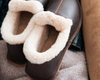 Sheepskin Moccasins in Dark Coffee Brown, close-up of the thick fleece lining at the heel
