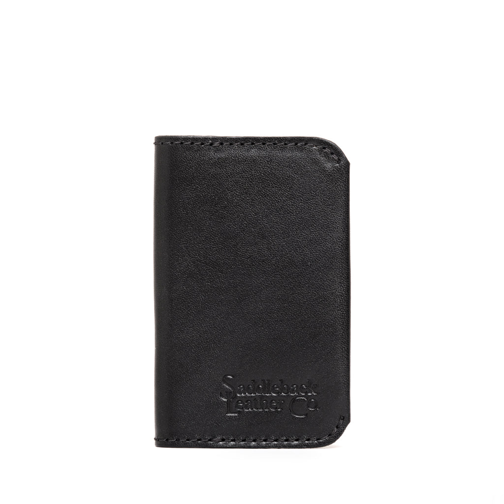Slim Business Card Holder in Black, front view with stitched edges and embossed logo