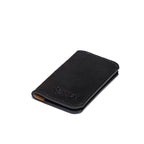 Slim Business Card Holder in Black, closed angled view with embossed logo