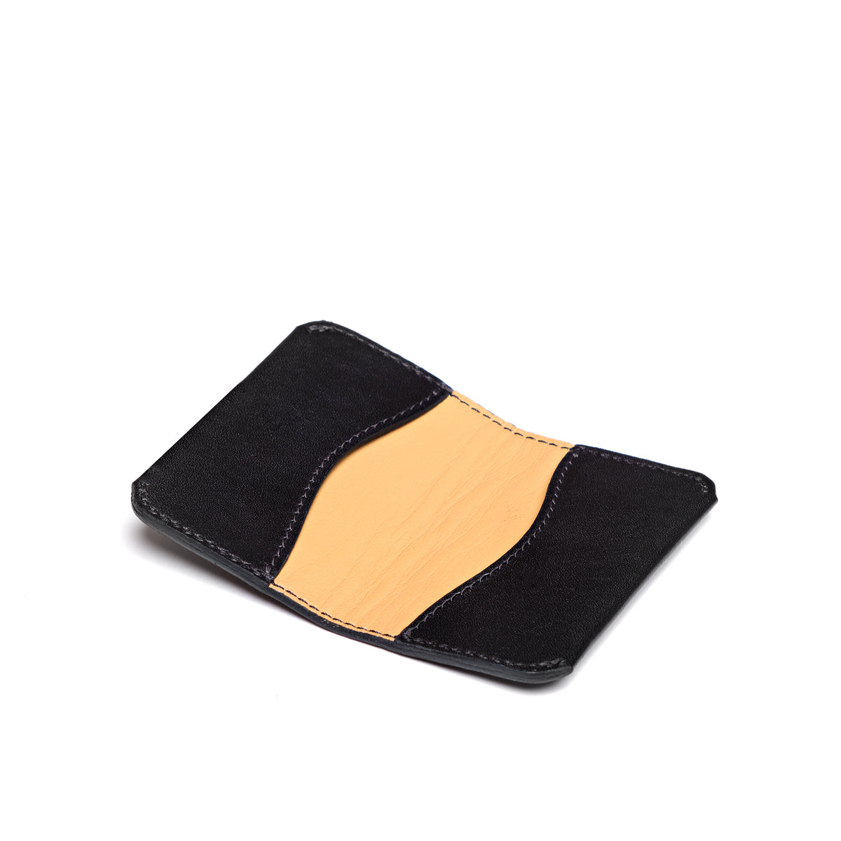Slim Business Card Holder in Black, open flat view showing the tan inner panel