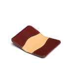 Slim Business Card Holder in Chestnut, open flat view showing the tan inner panel