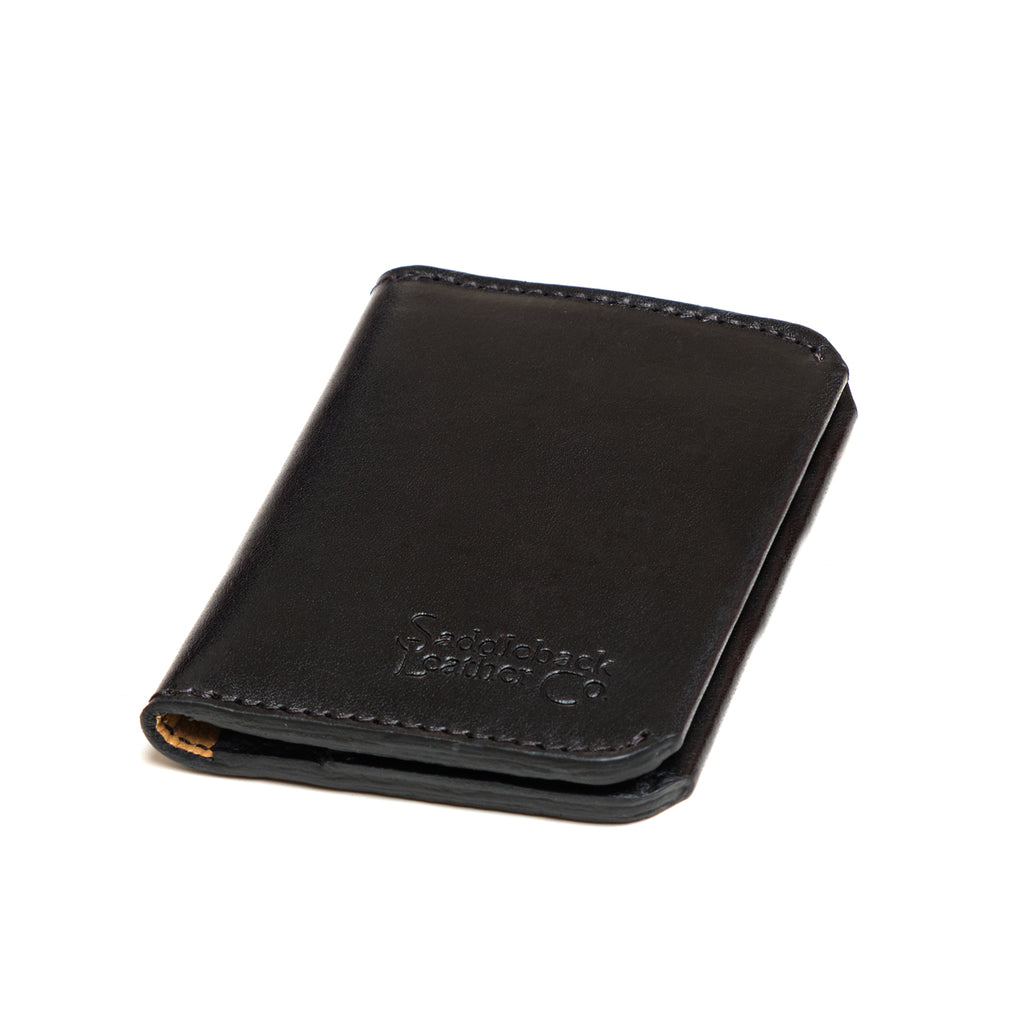 Slim Bifold Wallet in Black, closed angled view with embossed logo