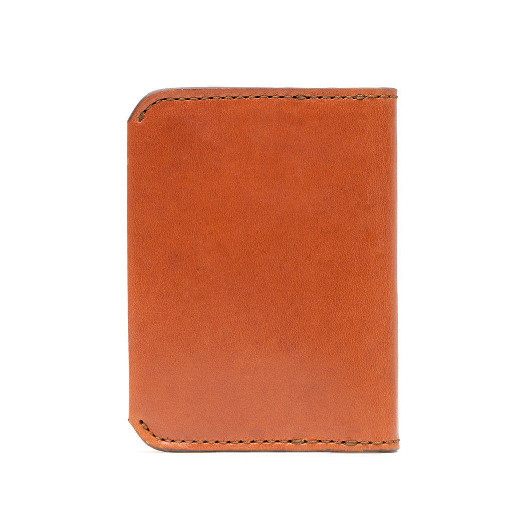 Slim Bifold Wallet in English Tan, closed back view with stitched edges