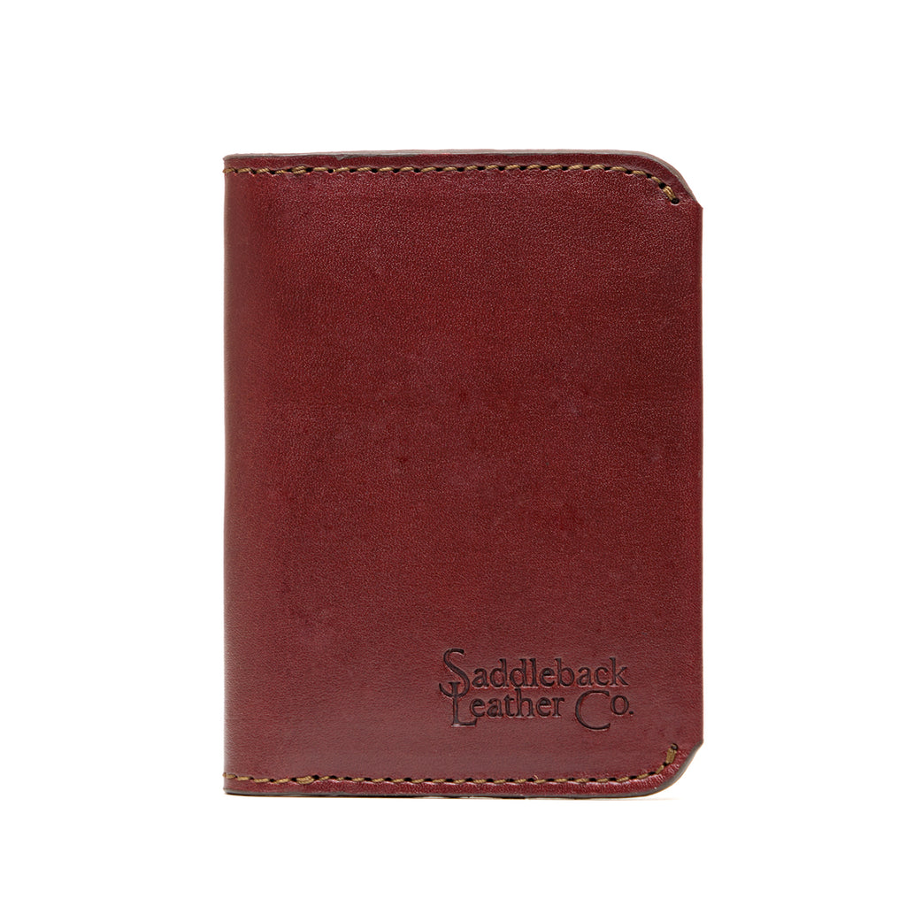 Slim Bifold Wallet in Chestnut, closed front view with embossed logo