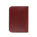 Slim Bifold Wallet in Chestnut, closed back view with stitched edges