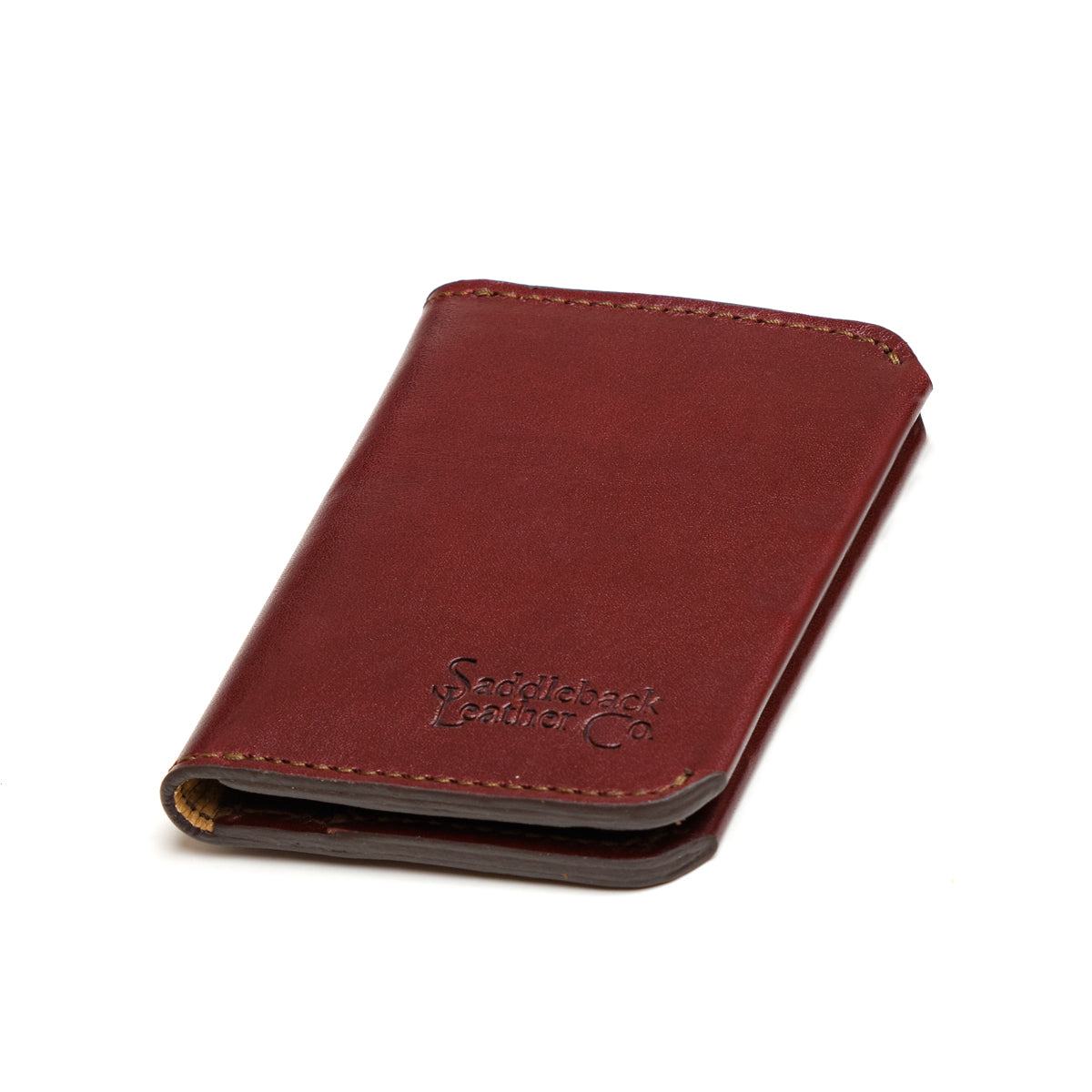 Slim Bifold Wallet in Chestnut, closed angled view with embossed logo