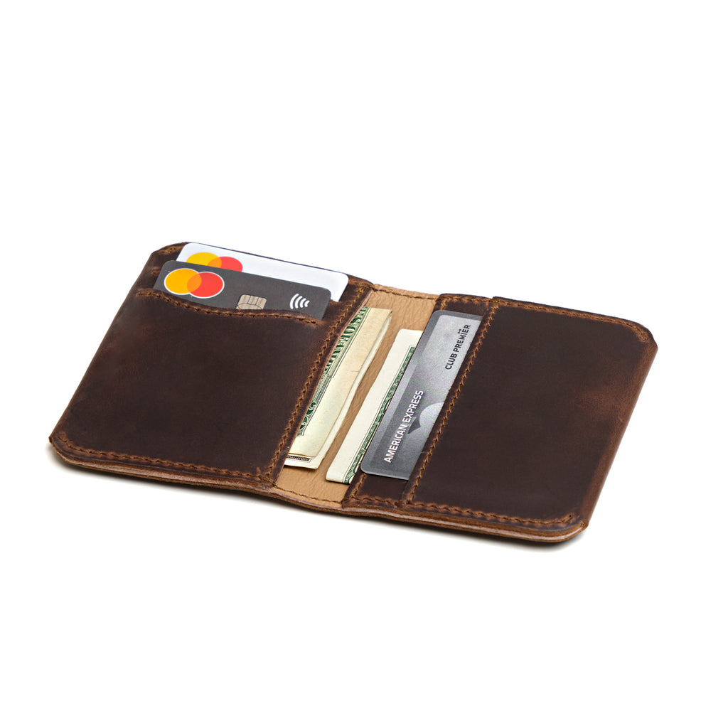 New Slim Leather Bifold Wallet in Dark Coffee Brown opened flat to show cards and cash in the slim pockets