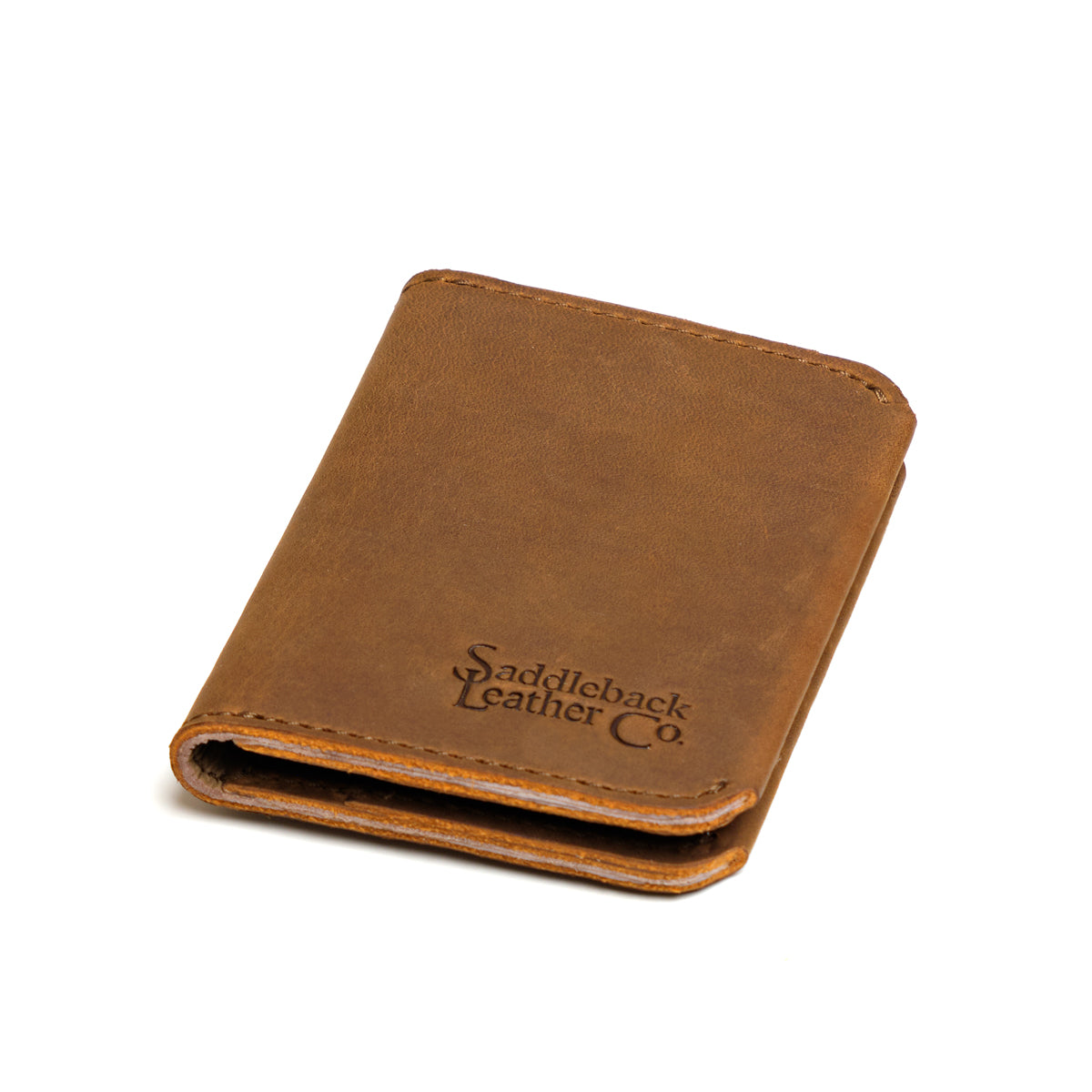 New Slim Leather Bifold Wallet in Tobacco, closed and angled to show the embossed logo and thin profile