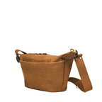 London Sling Small in Tobacco, angled side view showing the front pocket and strap clip