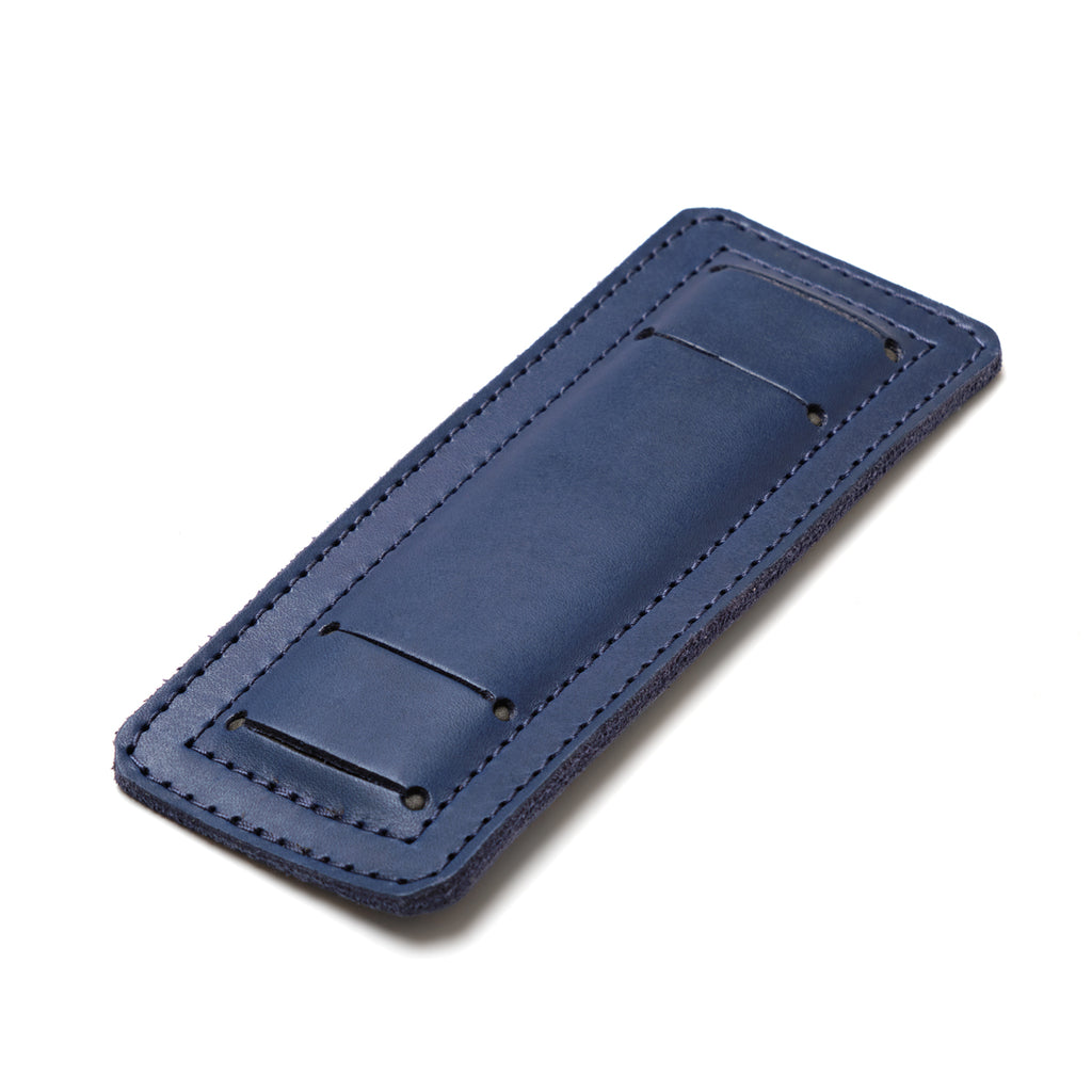 Freedom Collection Extra Shoulder Pad in Blue, angled underside view with strap slots and snaps