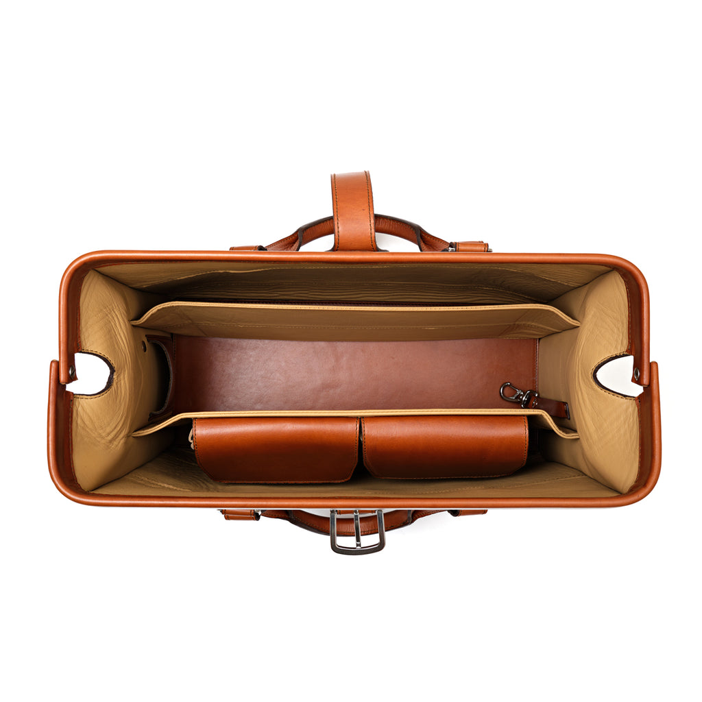 Spurgeon Briefcase in English Tan, top-down view of the open frame mouth showing tan-lined compartments