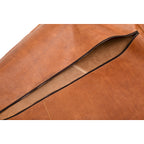 Garment Bag in Tobacco, close-up of the diagonal zipper partly open