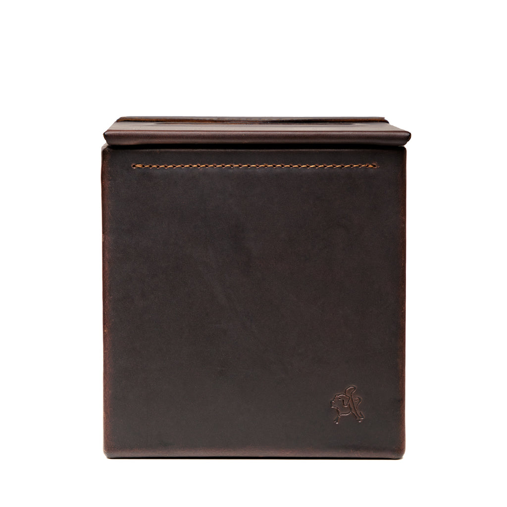 Tissue Box in Dark Coffee Brown leather, straight-on side view of the empty box with embossed pig logo