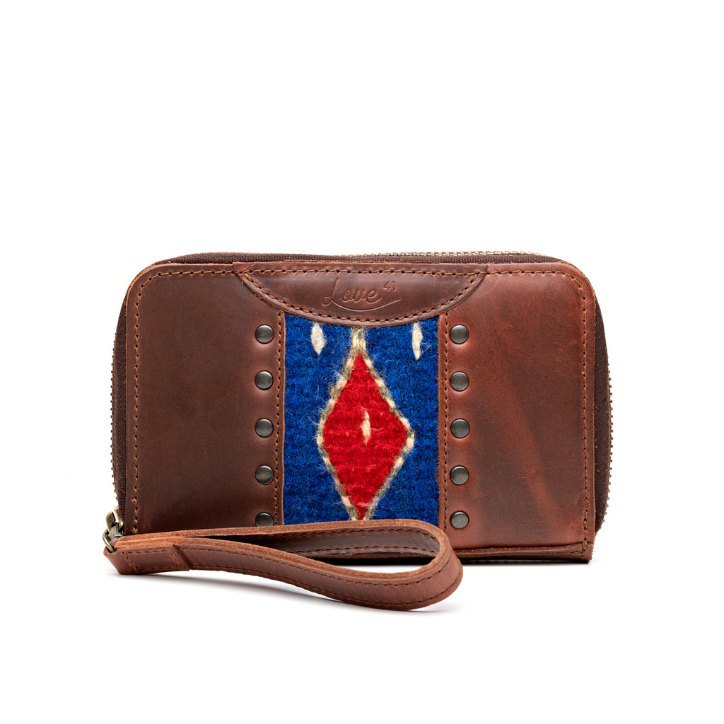 Lanita Thin Wallet in Chestnut, front view with woven diamond panel, studs and wrist strap