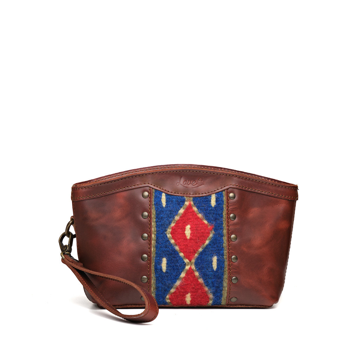 Lanita Leather Clutch in Chestnut, front view with blue and red woven panel, studs and wrist strap