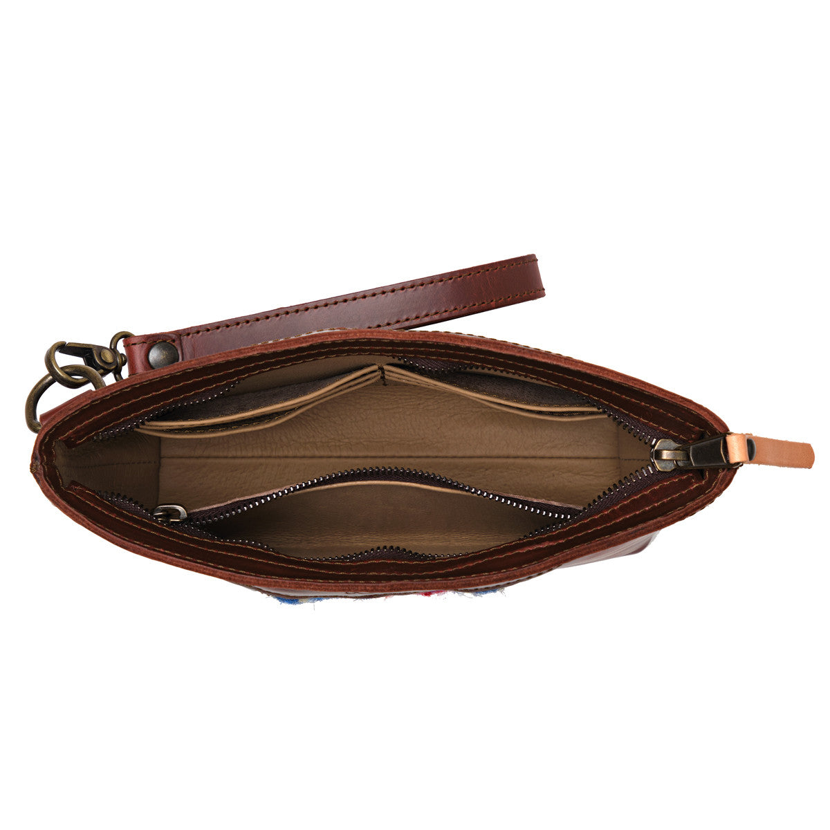 Lanita Leather Clutch in Chestnut, top-down view of empty unzipped interior with wrist strap