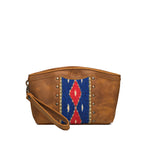 Lanita Leather Clutch in Tobacco, front view with blue and red woven panel, studs and wrist strap