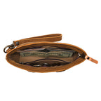 Lanita Leather Clutch in Tobacco, top-down view of unzipped interior holding cash and coins