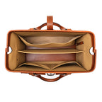 Blackstone Barrister Briefcase in English Tan, top-down view of the open frame mouth showing tan-lined compartments