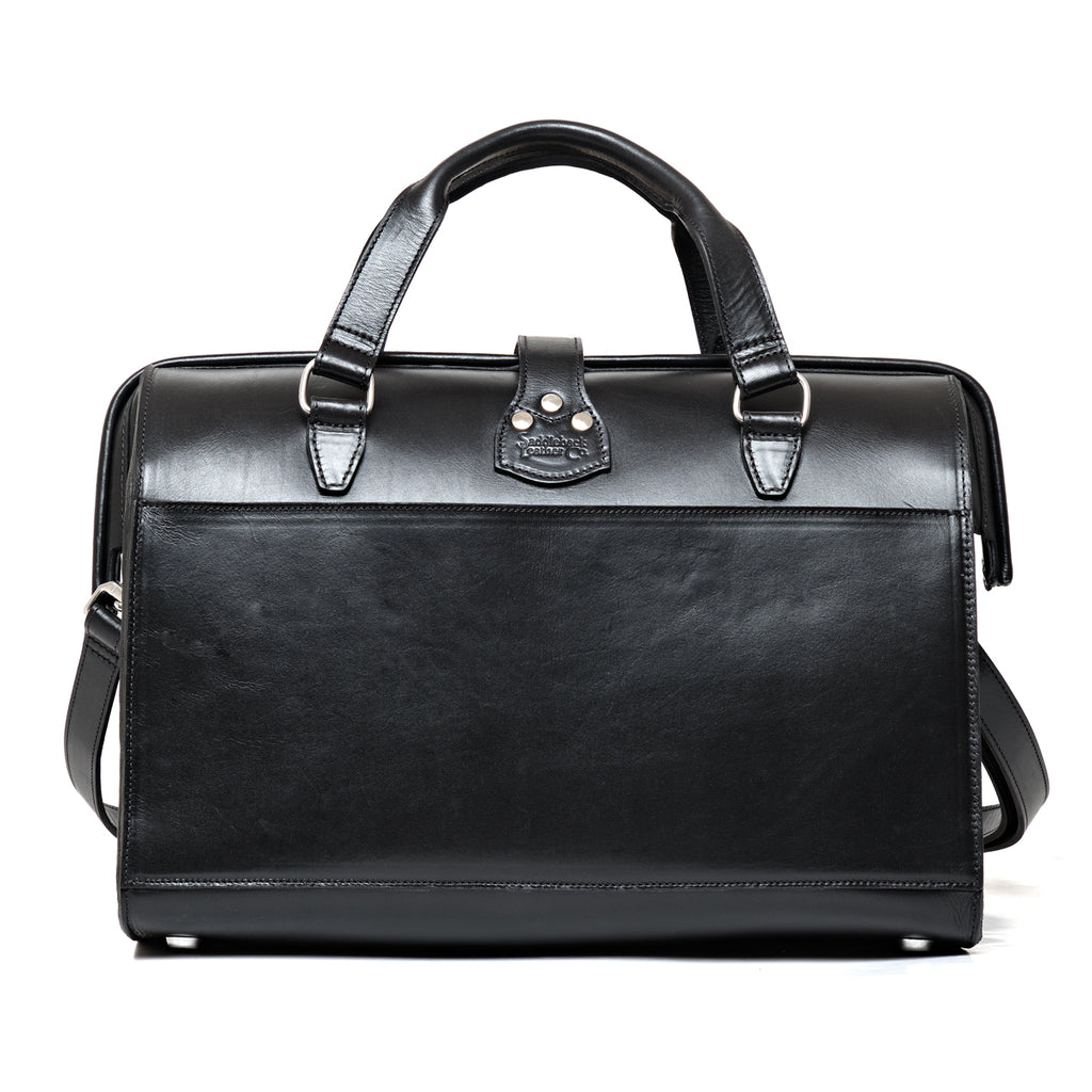 Blackstone Barrister Briefcase in Raven Black, back view with full-width slip pocket and top handles