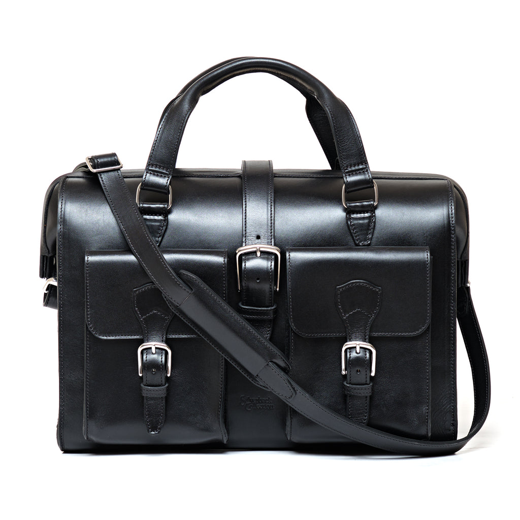 Blackstone Barrister Briefcase in Raven Black, front view with two buckled pockets and shoulder strap