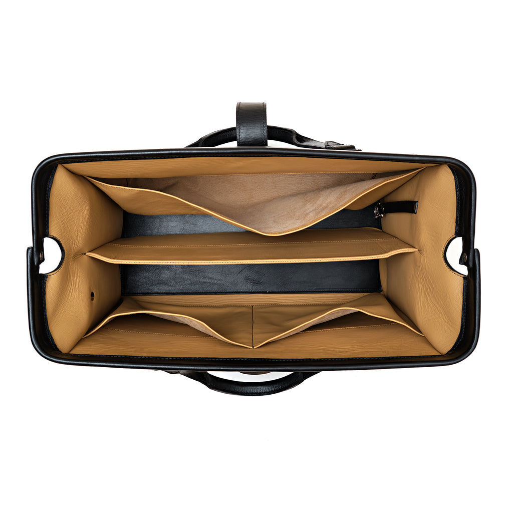 Blackstone Barrister Briefcase in Raven Black, top-down view of the open frame mouth showing tan-lined compartments