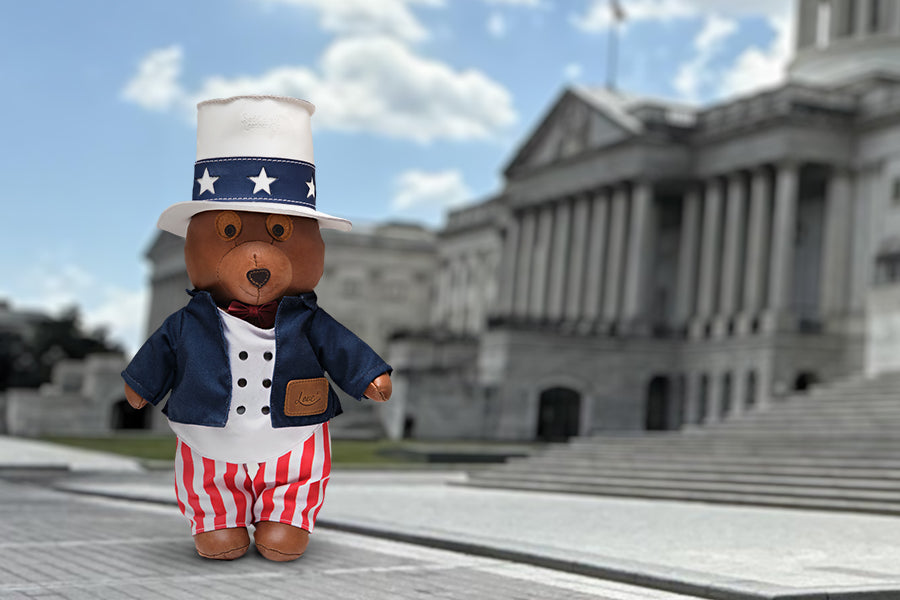 2026 Uncle Sam Teddy Bear in star top hat, navy jacket and striped pants standing before the U.S. Capitol