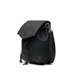 Mini Bucket Bag in Black, angled side view with flap, drawstring and strap clip