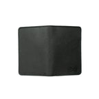 Slim Passport Wallet in Black opened flat face down, showing the full outer cover and embossed logo