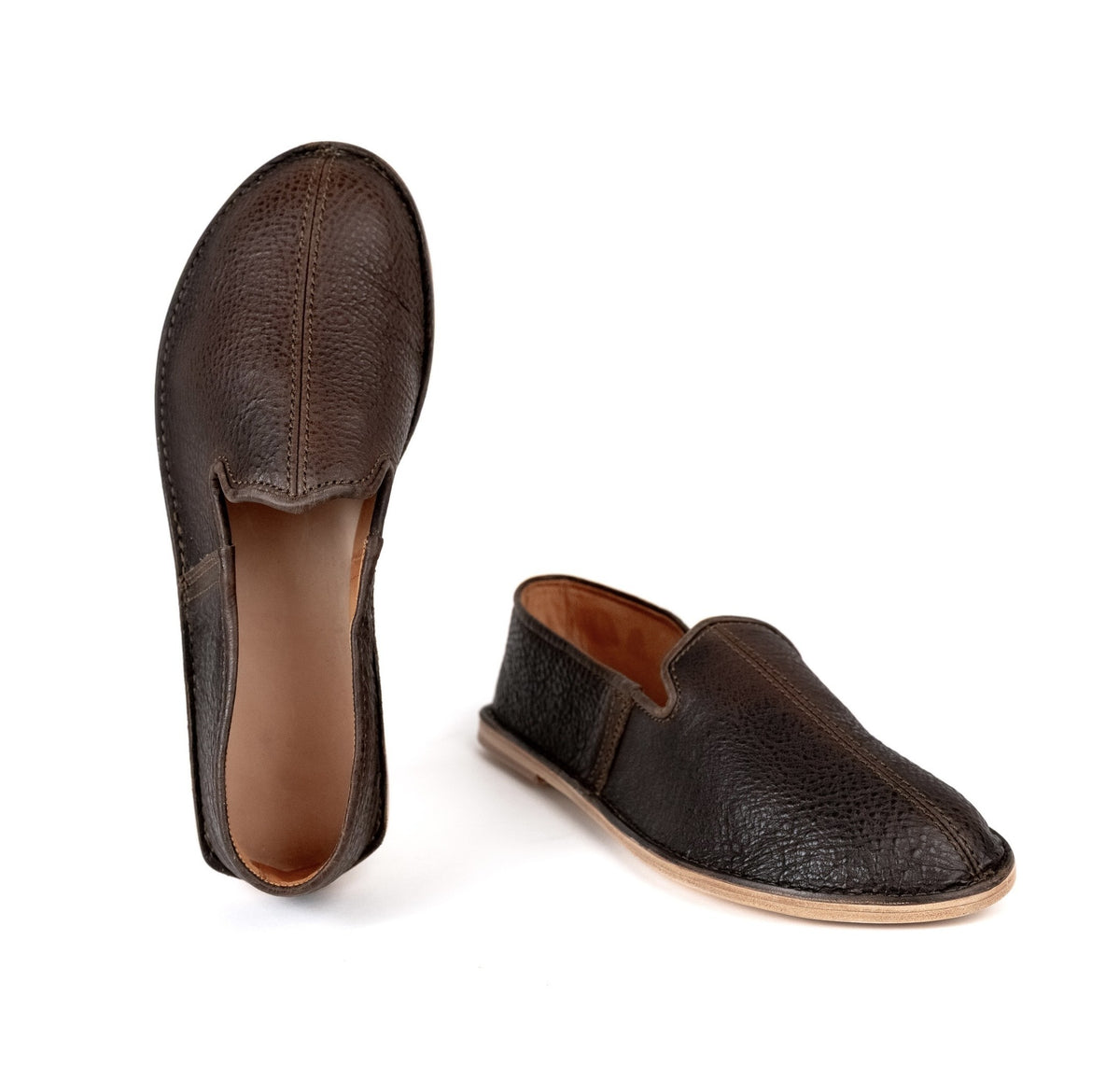 Barefoot Slip-on Shoe in Dark Coffee Brown, pair shown from the top and side on a white background