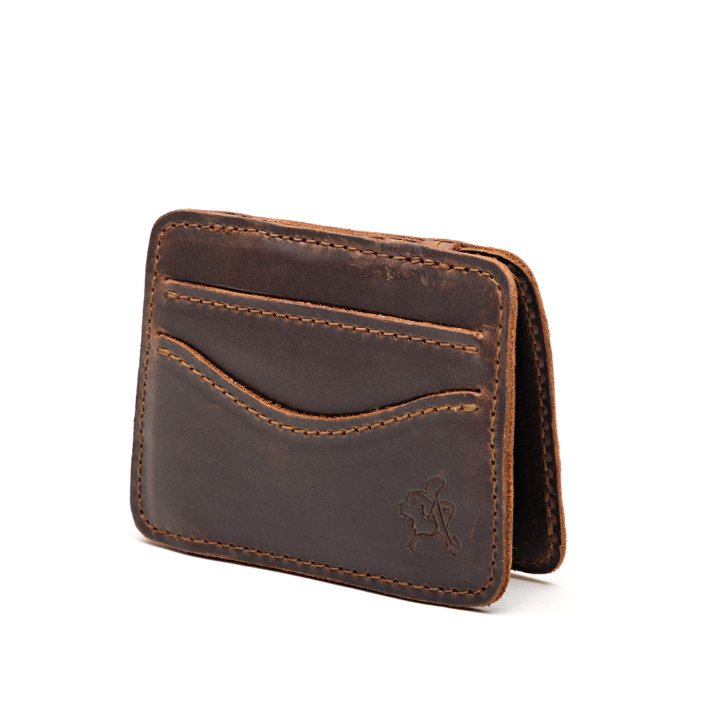 Front Pocket Magic Wallet in Dark Coffee Brown, angled view with curved card pockets and embossed emblem