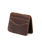 Front Pocket Magic Wallet in Dark Coffee Brown, angled view with curved card pockets and embossed logo