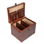 Leather Small Trunk in Chestnut, open with two buckled lid pockets and leather dividers inside a suede-lined interior