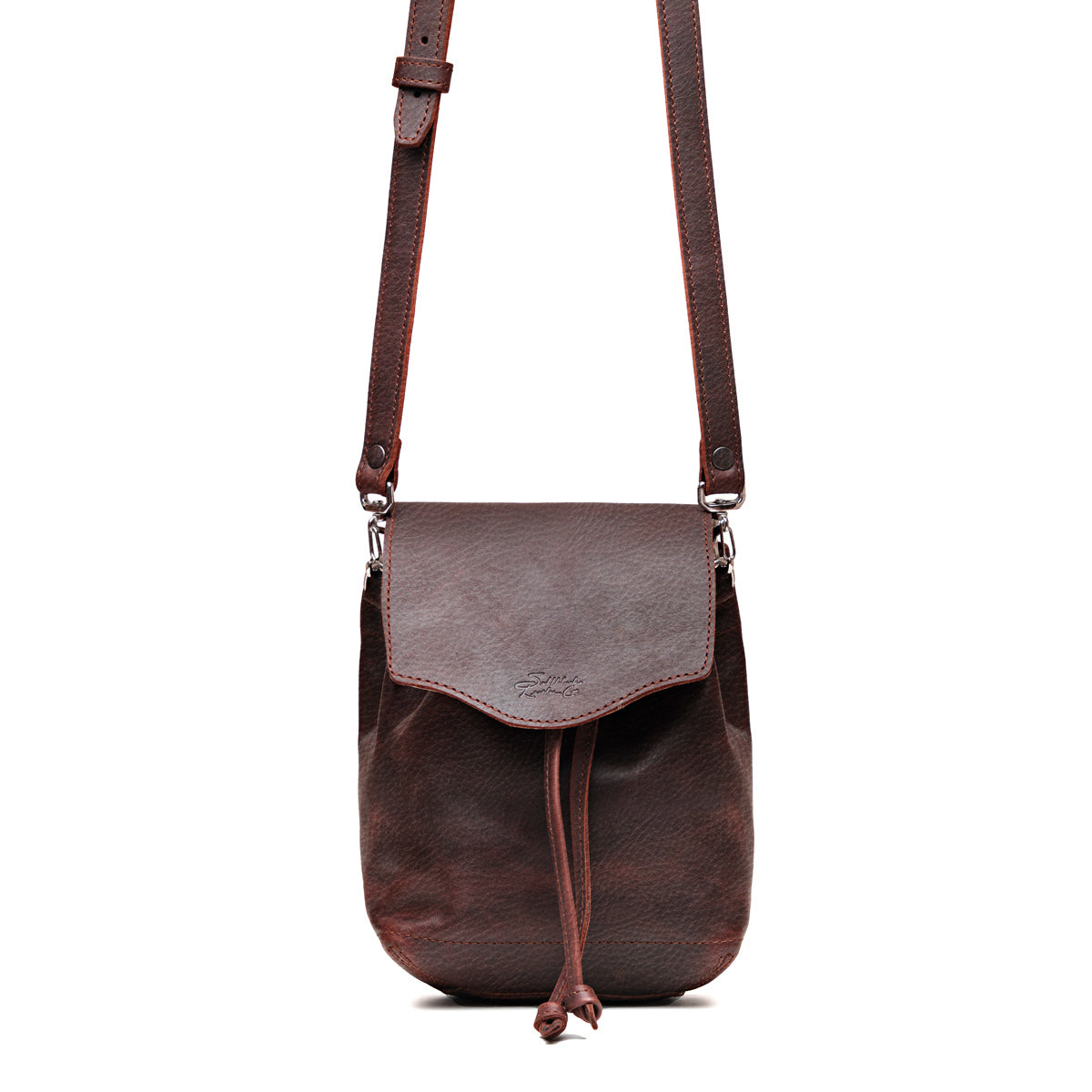 Mini Bucket Bag in Chestnut, front view with flap, drawstring tie and adjustable crossbody strap
