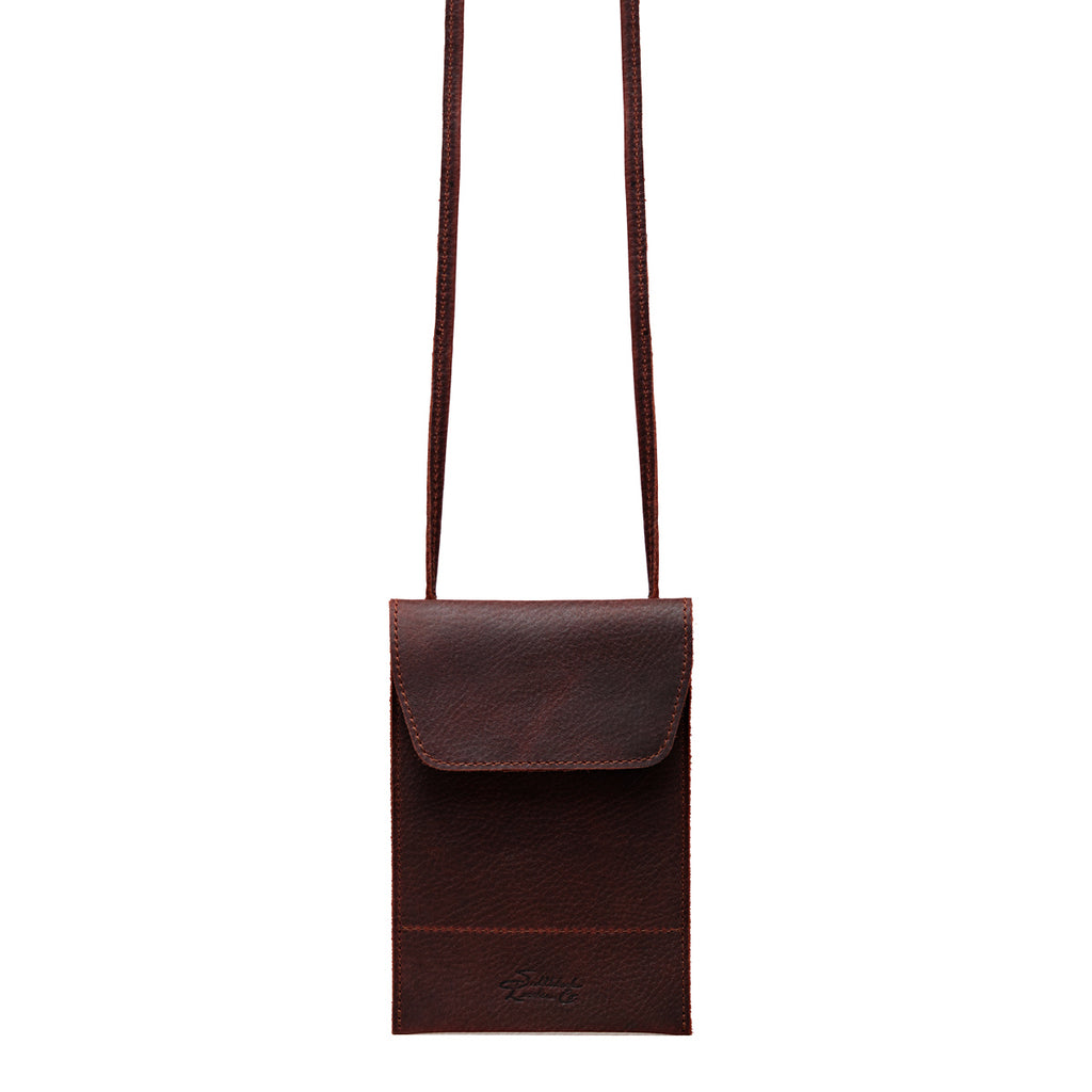 Walker's Pouch in Chestnut tumbled leather, front view with flap closure and long crossbody strap