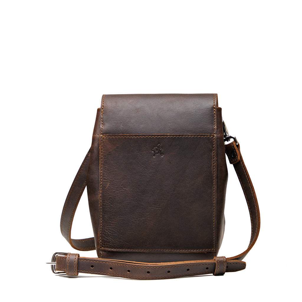 Mini Bucket Bag in Dark Coffee Brown, back view with slip pocket and adjustable strap