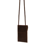 Walker's Pouch in dark brown, angled back view with slip pocket and long crossbody strap