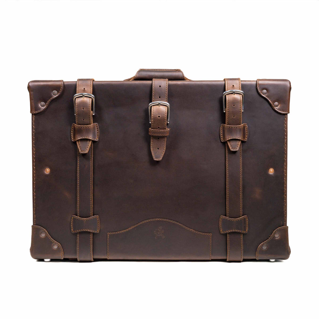 Grandfather Medium Suitcase in Dark Coffee Brown, front view with three buckle straps and riveted corner caps