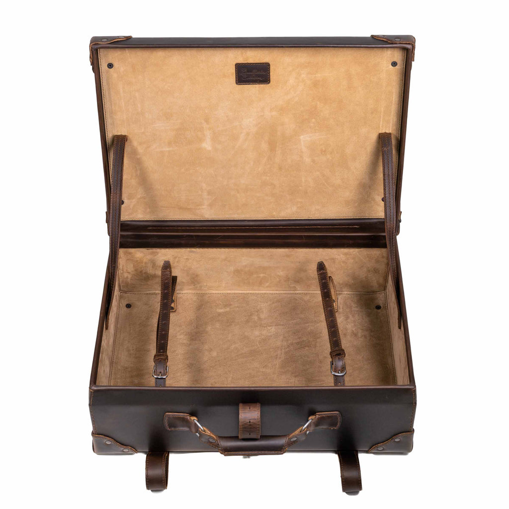 Grandfather Medium Suitcase in Dark Coffee Brown, opened to show the canvas lining and leather tie-down straps