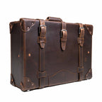 Grandfather Medium Suitcase in Dark Coffee Brown, angled front view with three buckle straps and top handle