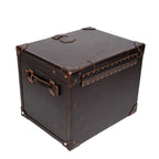 Leather Small Trunk in Dark Coffee Brown, closed back view showing riveted hinge strap, side handle and corner guards